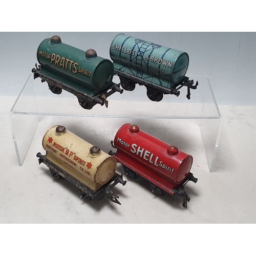 427 - Four Bing 0 gauge Tank Wagons comprising Shield's & Brown, Motor Shell Spirit, Motor BP Spirit and M... 