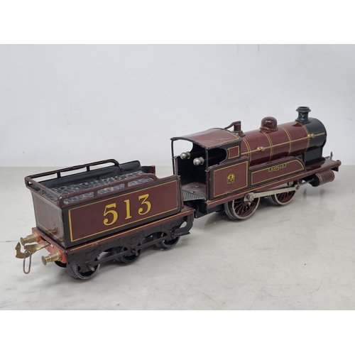 454 - A Bing 0 gauge clockwork LMS Maroon 0-4-0 Locomotive and tender 'Apollo' No.513, VG-Ex