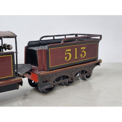 454 - A Bing 0 gauge clockwork LMS Maroon 0-4-0 Locomotive and tender 'Apollo' No.513, VG-Ex