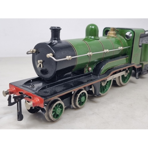 483 - A Bing 0 gauge 3-rail electric Great Western green 4-4-0 Locomotive and tender No.1373, generally VG... 