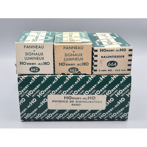 96 - A boxed Hornby Acho 6650 Signal Gantry, two boxed 662 Signals and 664 Slackening Device, all unused,... 