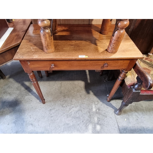 48 - A mahogany Side Table fitted single drawer and raised on turned and tapered supports, A/F, 29
