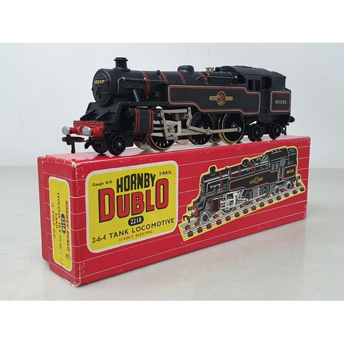 21 - A boxed Hornby Dublo 2218 2-6-4T with FMC, superb example showing no signs of use. Box is superb, co... 