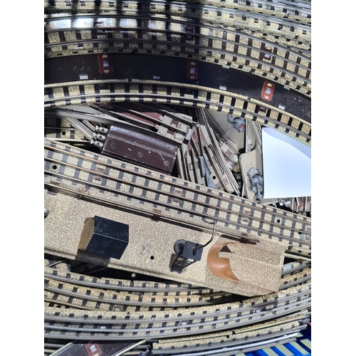 214 - A large quantity of over 200 pieces of Hornby Dublo 3-rail Track including Straights, Electric Point... 