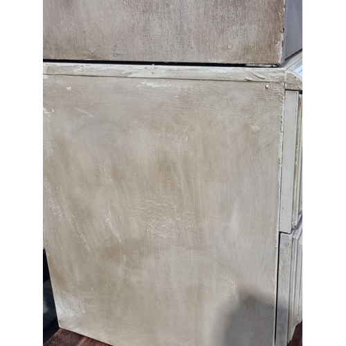 44 - A pair of modern painted Bedside Chests fitted two drawers, 1ft 9