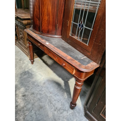 46 - A 19th century mahogany Writing Table fitted two drawers on turned legs, 4ft 6in x 2ft 2in. (R6).