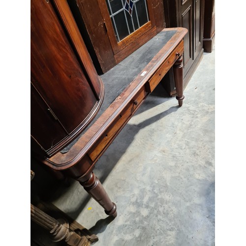 46 - A 19th century mahogany Writing Table fitted two drawers on turned legs, 4ft 6in x 2ft 2in. (R6).