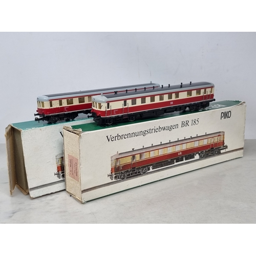 305 - Two boxed Piko H0 scale BR 186 DR diesel Railcars, both VG, boxes P-F