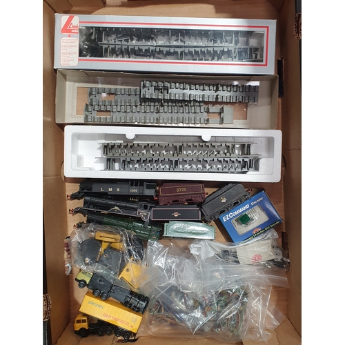 398 - A quantity of 00 gauge Locomotive Bodies, Coach Interiors and Electrical Spares to include; loco bod... 