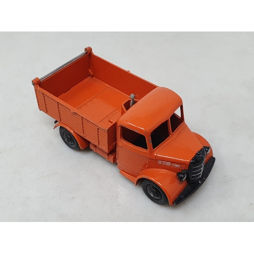 521 - An unboxed Dinky Toys No.25m orange Bedford End Tipper, M