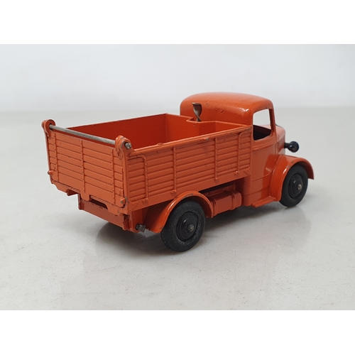 521 - An unboxed Dinky Toys No.25m orange Bedford End Tipper, M