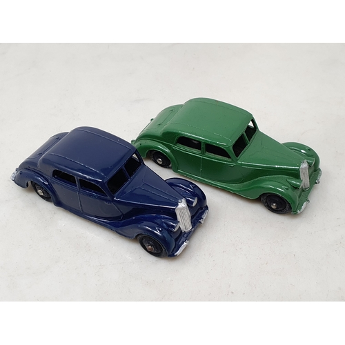 526 - Two unboxed Dinky Toys No.4a Riley Saloons, one green and one dark blue, both M