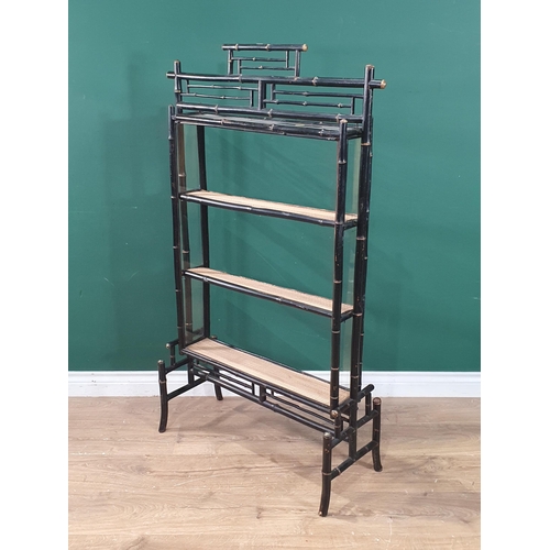 1 - An Ebonised faux bamboo open bookcase, 4ft 3