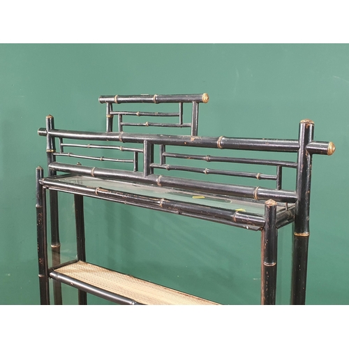 1 - An Ebonised faux bamboo open bookcase, 4ft 3