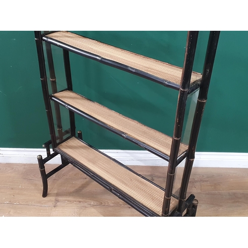 1 - An Ebonised faux bamboo open bookcase, 4ft 3