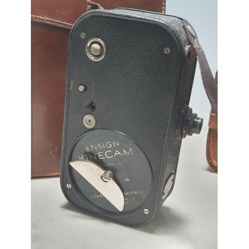 13 - A Paillard Bolex Cine Camera with accessories in leather case, and a Ensign Kinecam Model 4 Cine Cam... 