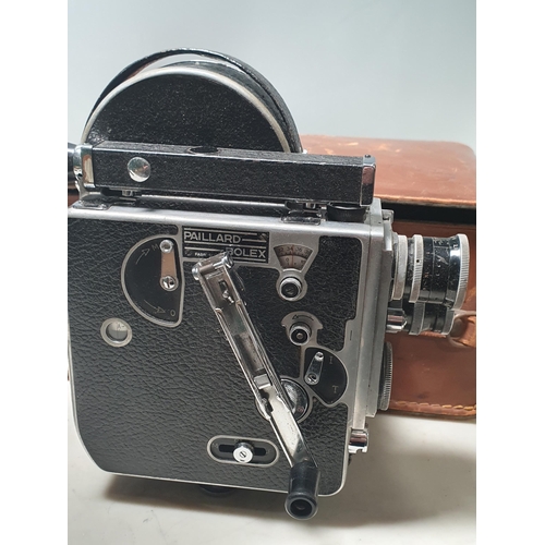 13 - A Paillard Bolex Cine Camera with accessories in leather case, and a Ensign Kinecam Model 4 Cine Cam... 