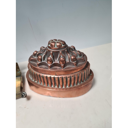 18 - A Benham and Froud copper Jelly Mould with castellated design, 6in H, an oval copper Jelly Mould sta... 