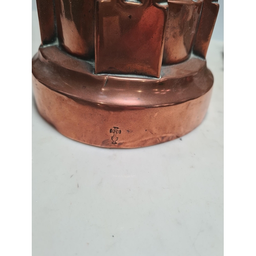 18 - A Benham and Froud copper Jelly Mould with castellated design, 6in H, an oval copper Jelly Mould sta... 