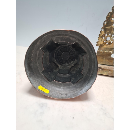 18 - A Benham and Froud copper Jelly Mould with castellated design, 6in H, an oval copper Jelly Mould sta... 