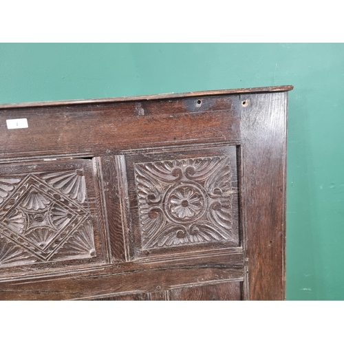 2 - An Oak headboard with three carved panels, (R7).