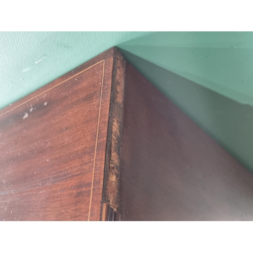 33 - A mahogany bow front Chest of two short over three long graduated Drawers with satinwood stringing, ... 