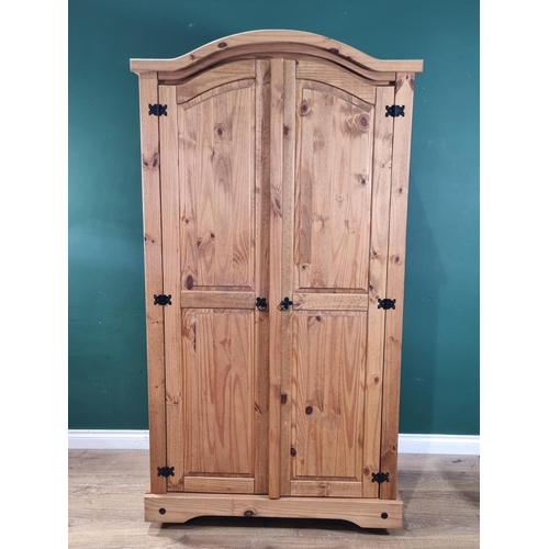 35 - A modern pine two door wardrobe, (R1).