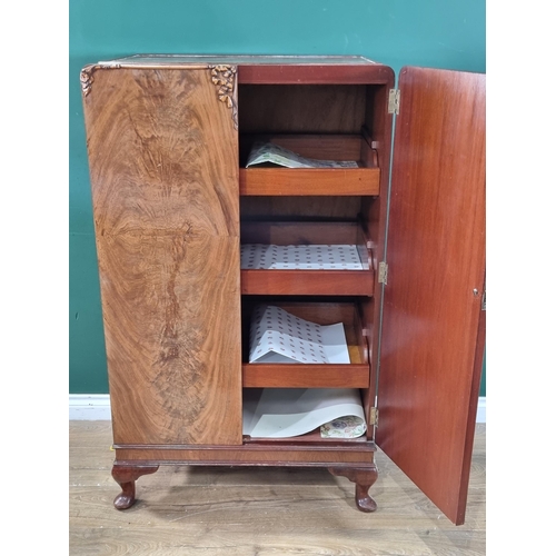 36 - A vintage walnut bedroom suite comprising of a mirror back dressing table, two door wardrobe and a b... 