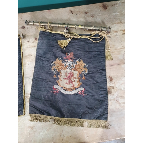4 - A pair of embroided armorial crests, (R6).