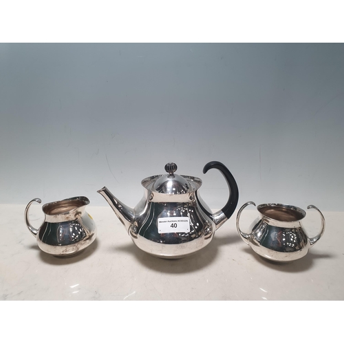 40 - An Eric Clements silver plated three-piece Tea Service consisting of Teapot, Sugar Bowl and Milk Jug... 