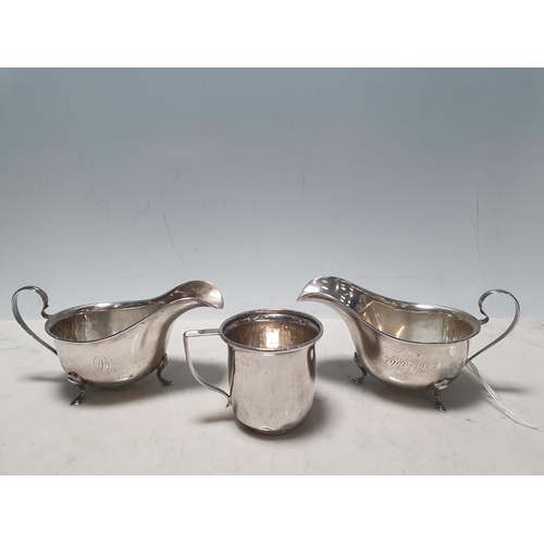 42 - A pair of George V silver Sauce Boats, with pad feet and engraved initials 'Birmingham 1924', and a ... 