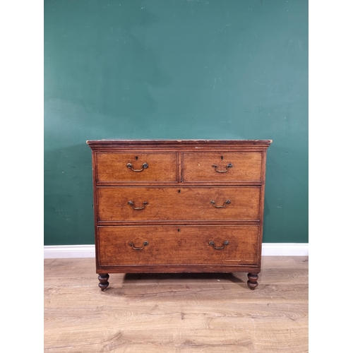 5 - An oak Chest of two short over two long Drawers raised on turned supports, 37