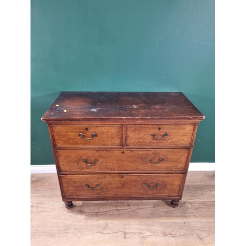 5 - An oak Chest of two short over two long Drawers raised on turned supports, 37