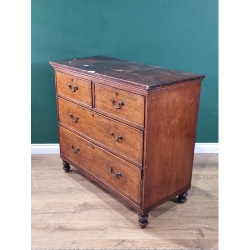 5 - An oak Chest of two short over two long Drawers raised on turned supports, 37