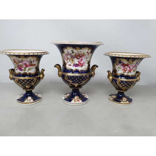 63 - A Garniture of three Coalport two handled Vases painted bouquets of  flowers with blue and gilt surr... 