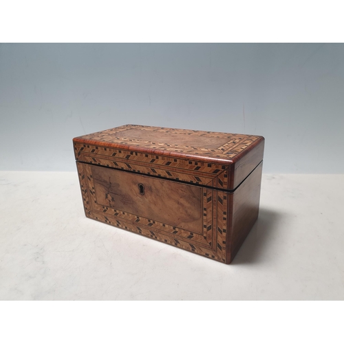 8 - A walnut and parquetry Tea Caddy with hinged cover enclosing two covered compartments, 9in W, (R3)