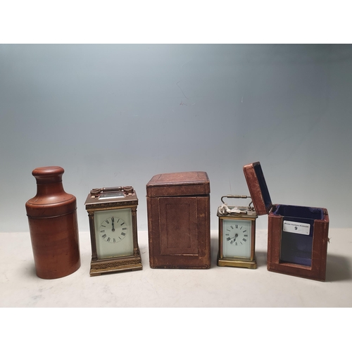 9 - A large brass cased Carriage Clock with fluted columns and original carry case, 6in H, A/F, a brass ... 