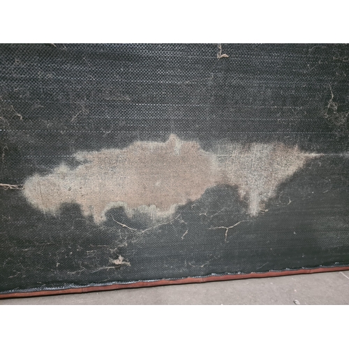 27 - A tan leather two seater Settee, raised on circular bun feet, 4ft 11