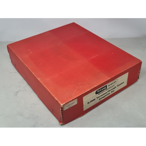 169 - A boxed Triang Hornby 5083 Terminal Station, contents complete and appear unused, M, plastic packets... 