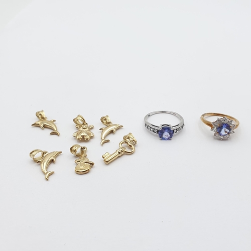 Two 9ct gold gem-set Rings and a quantity of 9ct gold Charms, approx 6.9gms