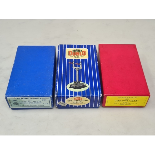 102 - A reference collection of three boxed Hornby Dublo ED3/5075 Electric Home Junction Signals comprisin... 