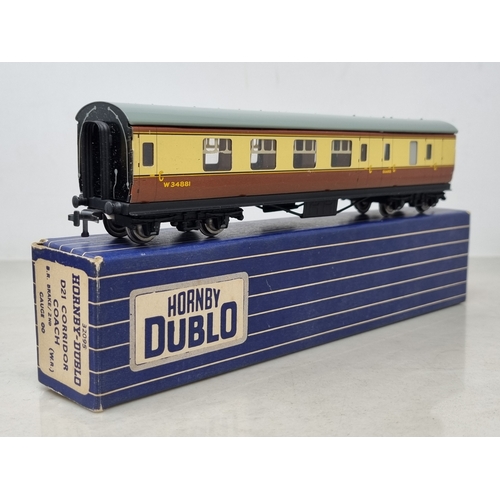 129 - A rake of four boxed Hornby Dublo WR 3-rail Coaches comprising 2x Brake/2nd, 1/2nd and D20 Restauran... 