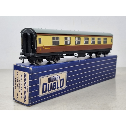 129 - A rake of four boxed Hornby Dublo WR 3-rail Coaches comprising 2x Brake/2nd, 1/2nd and D20 Restauran... 