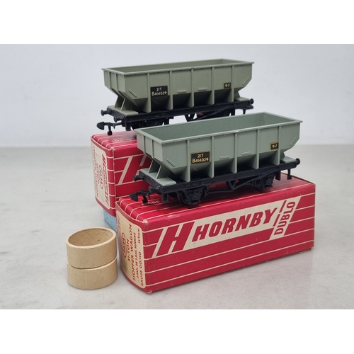 153 - A pair of boxed Hornby Dublo 4644 21-ton Hopper Wagons, both Ex plus, boxes VG-Ex (one has taped end... 