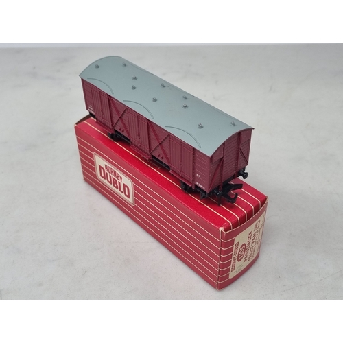 154 - A boxed Hornby Dublo 4323 SR 4-wheel Utility Van and a boxed 4305 BR (WR) Passenger Fruit Van, both ... 