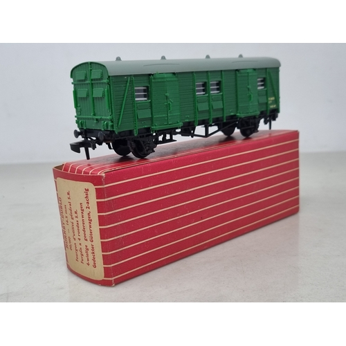 154 - A boxed Hornby Dublo 4323 SR 4-wheel Utility Van and a boxed 4305 BR (WR) Passenger Fruit Van, both ... 