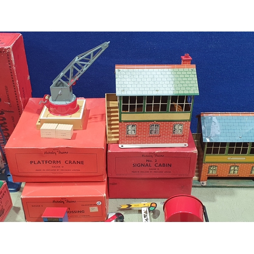 348 - A collection of Hornby 0 gauge Lineside Accessories comprising boxed No.2 Signal Cabin, boxed No.1 L... 