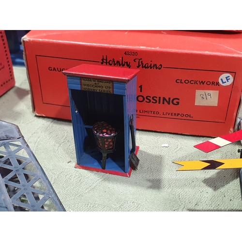348 - A collection of Hornby 0 gauge Lineside Accessories comprising boxed No.2 Signal Cabin, boxed No.1 L... 