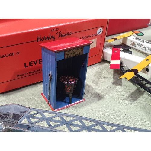 348 - A collection of Hornby 0 gauge Lineside Accessories comprising boxed No.2 Signal Cabin, boxed No.1 L... 