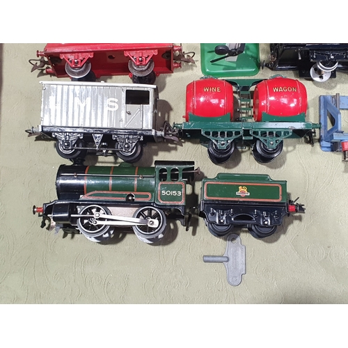 352 - A quantity of Hornby 0 gauge including a clockwork No.501 0-4-0 Locomotive and tender in BR green li... 
